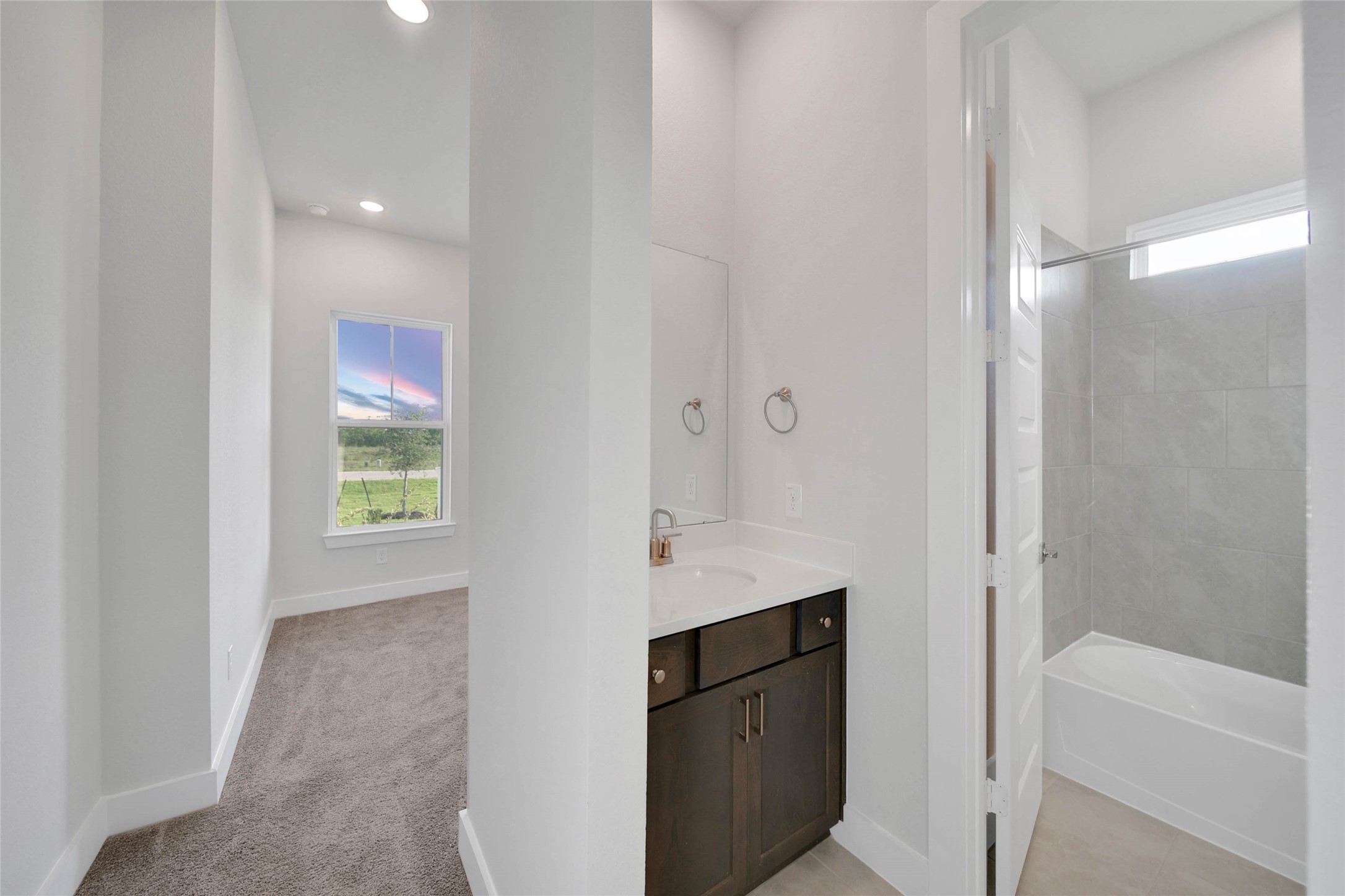 4515 Magnolia Bend Drive Rosharon, TX 77583 - Photo 28 of 46 a spacious bathroom with a granite countertop sink a toilet and shower