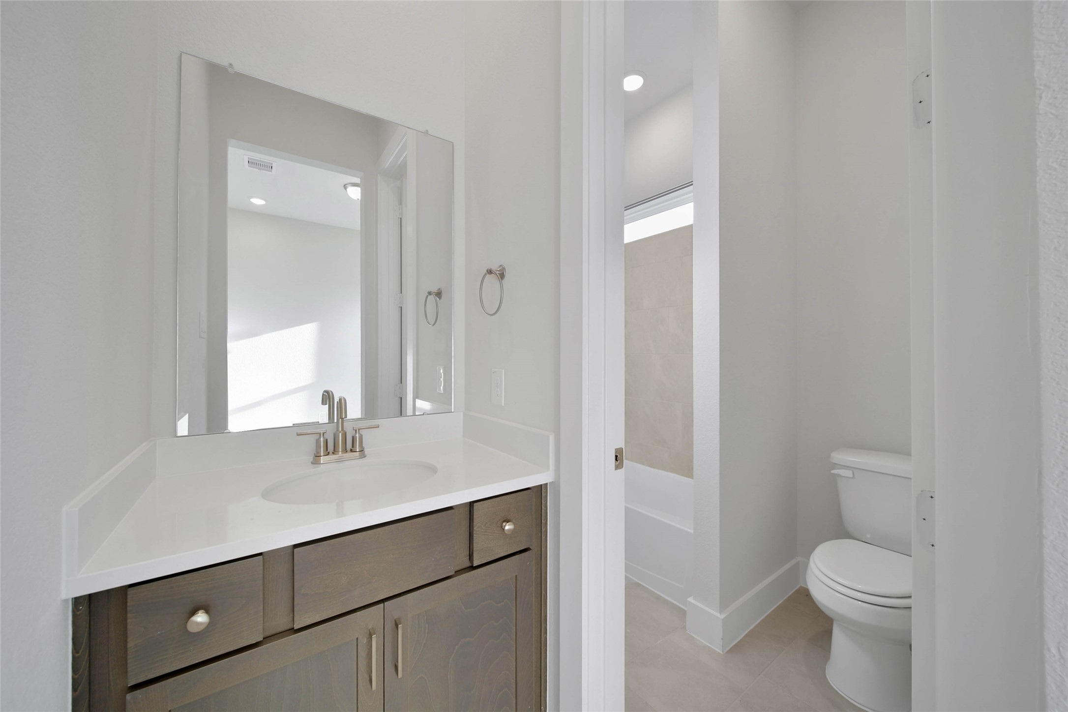 4515 Magnolia Bend Drive Rosharon, TX 77583 - Photo 32 of 46 a bathroom with a sink a toilet and shower