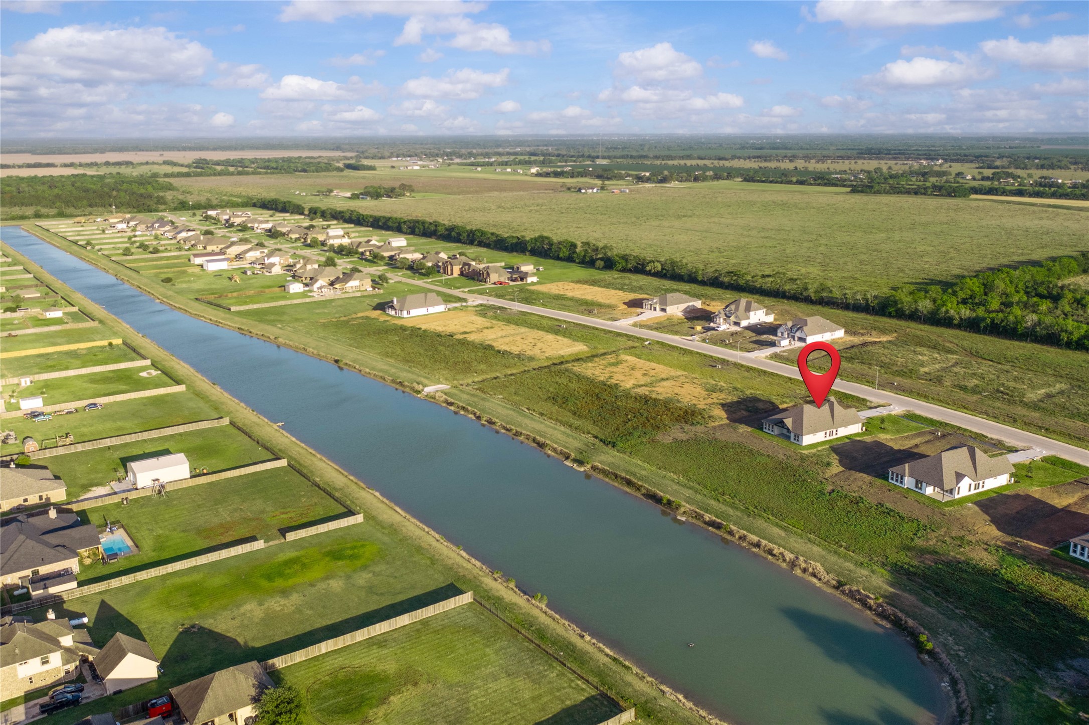 4515 Magnolia Bend Drive Rosharon, TX 77583 - Photo 42 of 46 a view of an ocean and a houses