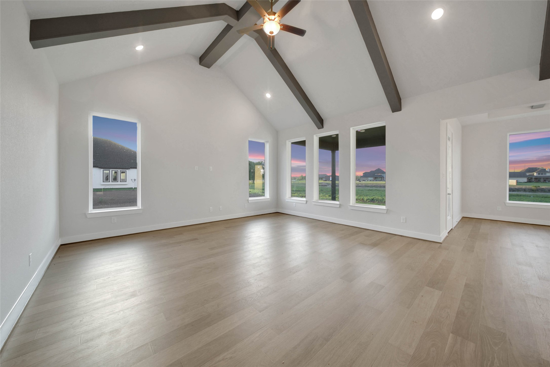4515 Magnolia Bend Drive Rosharon, TX 77583 - Photo 6 of 46 wooden floor in an empty room with a window