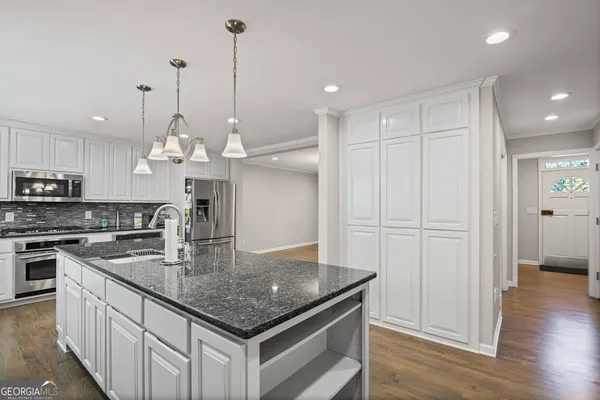 a bathroom with a sink and a vanity