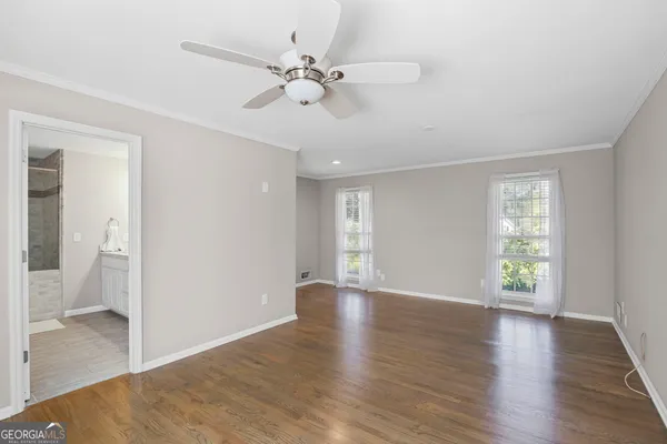 a bathroom with a shower and a toilet