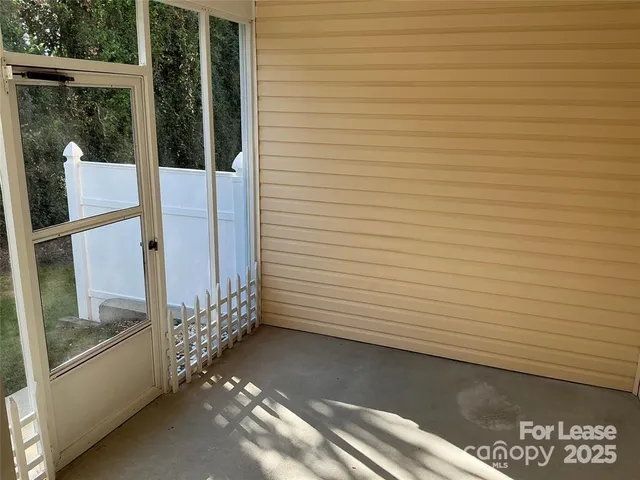 a view of a porch with a door