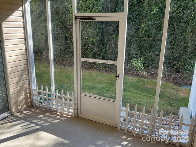 a view of backyard with green space