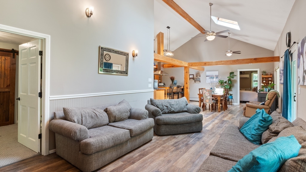16 Sandy Cove Road Lunenburg, MA 01462 - Photo 12 of 38 a living room with furniture and wooden floor