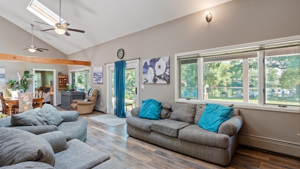 16 Sandy Cove Road Lunenburg, MA 01462 - Photo 13 of 38 a living room with furniture and a large window