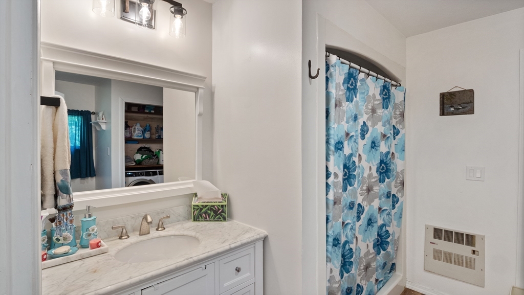 16 Sandy Cove Road Lunenburg, MA 01462 - Photo 28 of 38 a bathroom with a sink and a mirror
