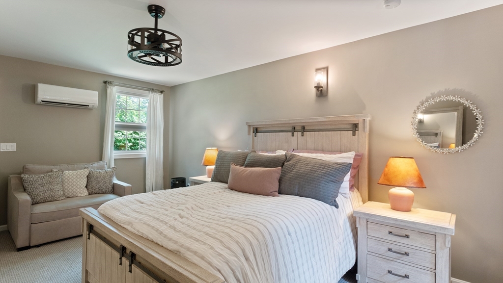 16 Sandy Cove Road Lunenburg, MA 01462 - Photo 30 of 38 a bedroom with a bed and dresser
