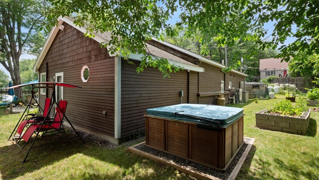 16 Sandy Cove Road Lunenburg, MA 01462 - Photo 36 of 38 a view of house with backyard and entertaining space