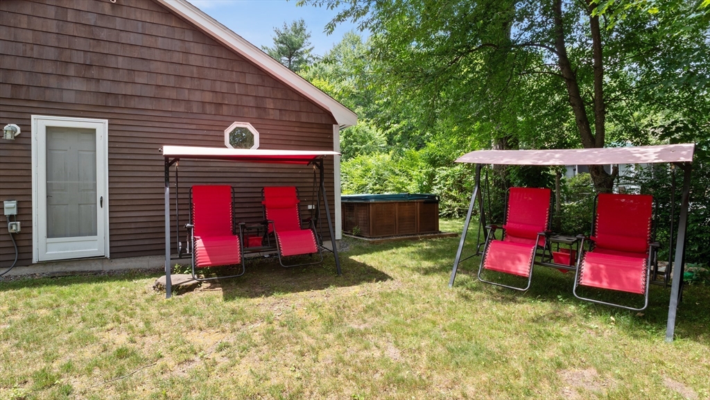 16 Sandy Cove Road Lunenburg, MA 01462 - Photo 5 of 38 a view of a backyard with a small barn
