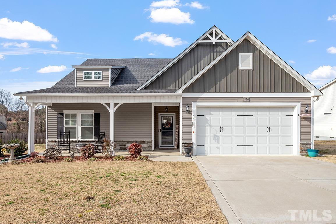 196 Fairview Street Clayton, NC 27520 - Photo 1 of 21 a front view of a house with a yard