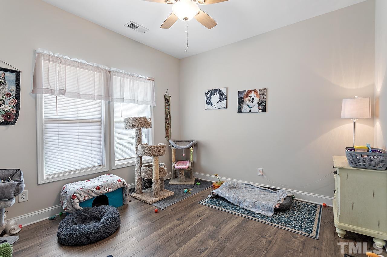 196 Fairview Street Clayton, NC 27520 - Photo 15 of 21 a living room with furniture and a window