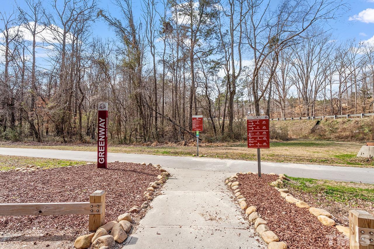 196 Fairview Street Clayton, NC 27520 - Photo 21 of 21 a street sign on a sidewalk next to a road