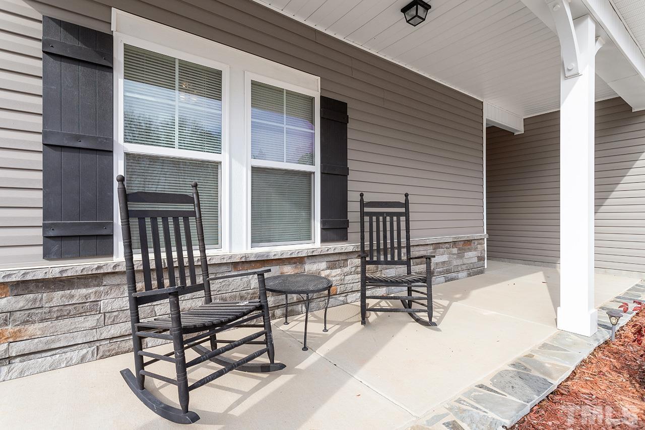 196 Fairview Street Clayton, NC 27520 - Photo 3 of 21 a view of two chairs in the balcony
