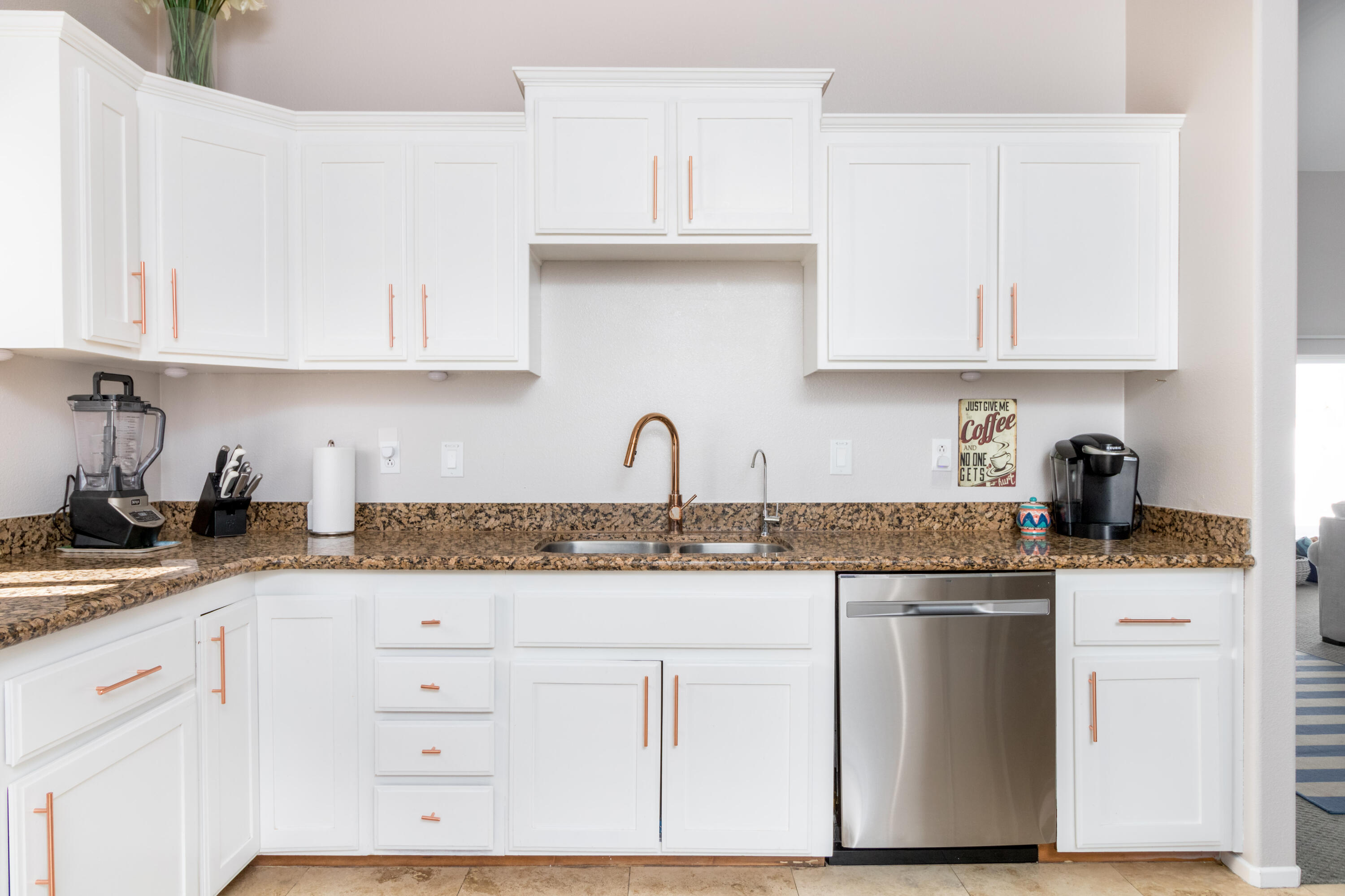 12753 Mountain View Road Desert Hot Springs, CA 92240 - Photo 17 of 45 a kitchen with granite countertop white cabinets and white appliances