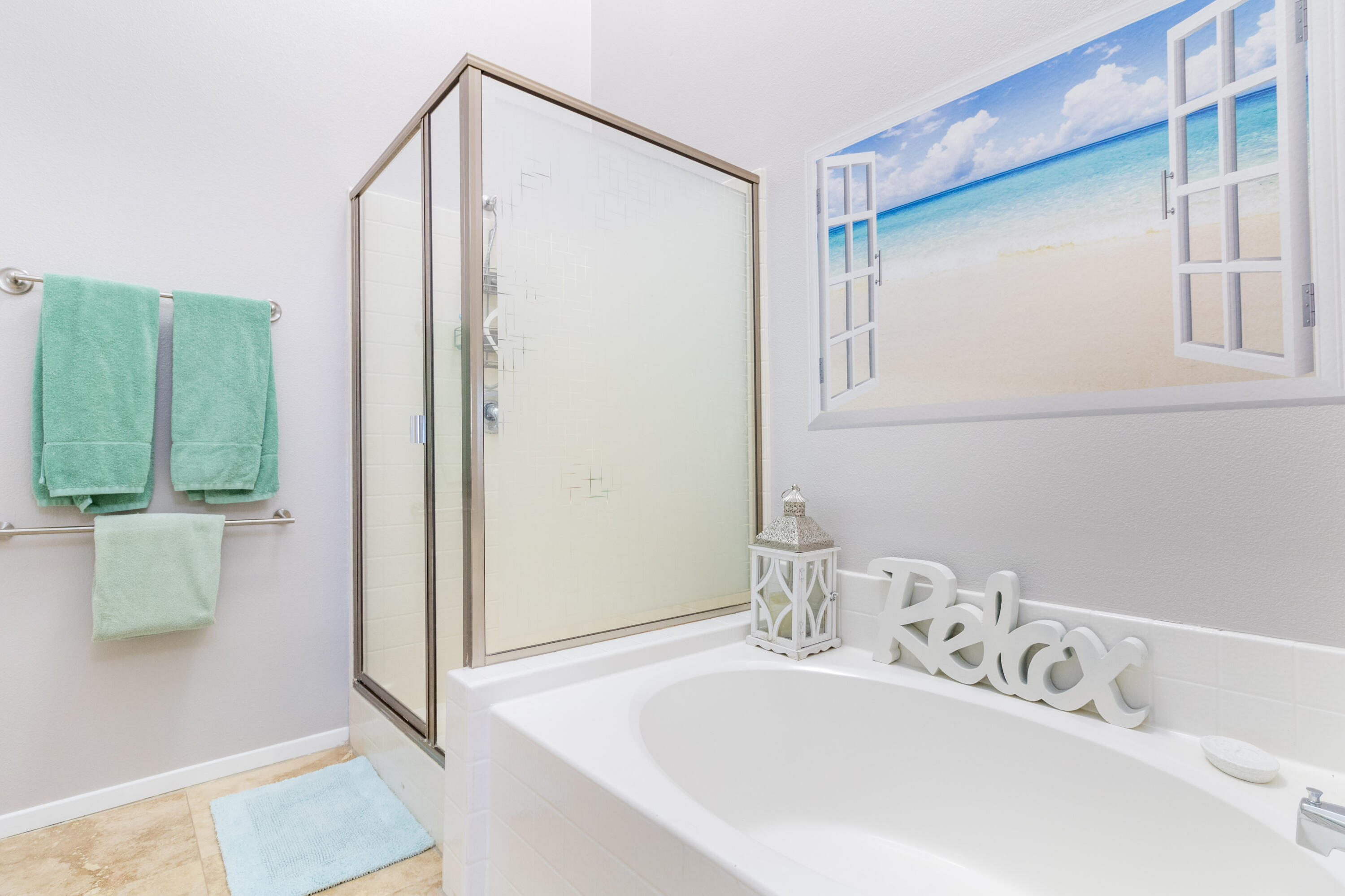 12753 Mountain View Road Desert Hot Springs, CA 92240 - Photo 24 of 45 a bathroom with a bathtub and a shower