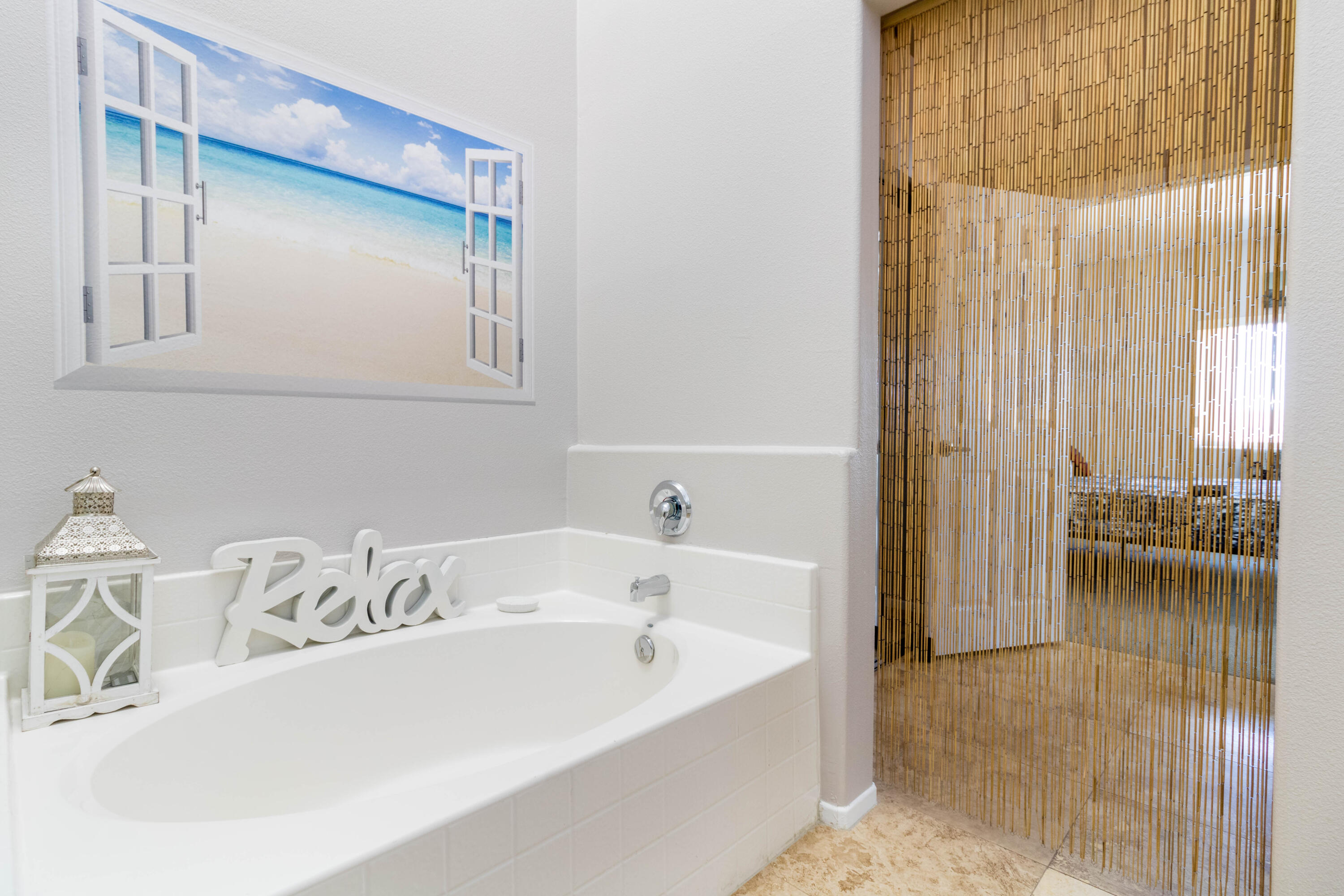 12753 Mountain View Road Desert Hot Springs, CA 92240 - Photo 25 of 45 a bathroom with a tub and shower