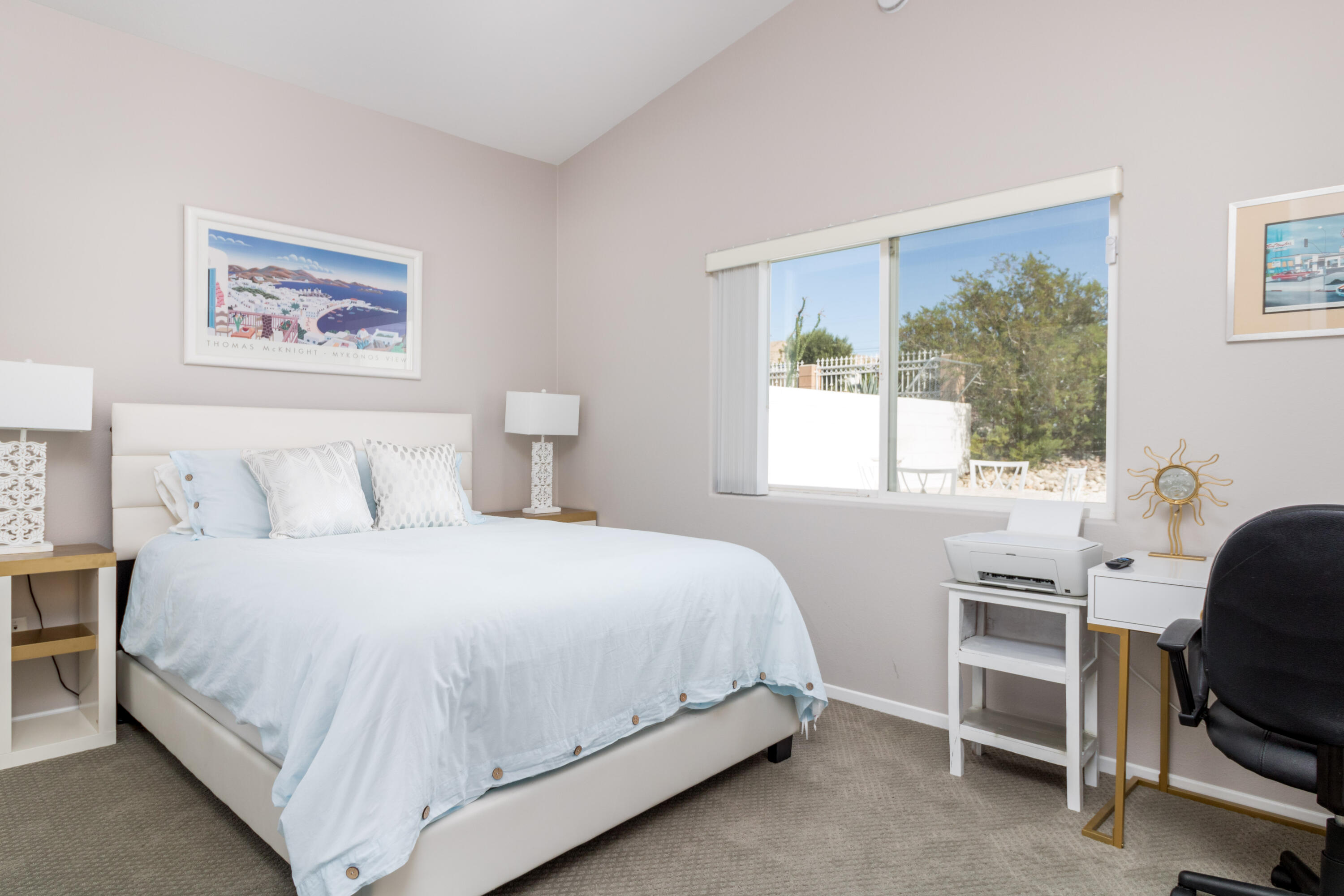 12753 Mountain View Road Desert Hot Springs, CA 92240 - Photo 27 of 45 a bedroom with a bed and a window