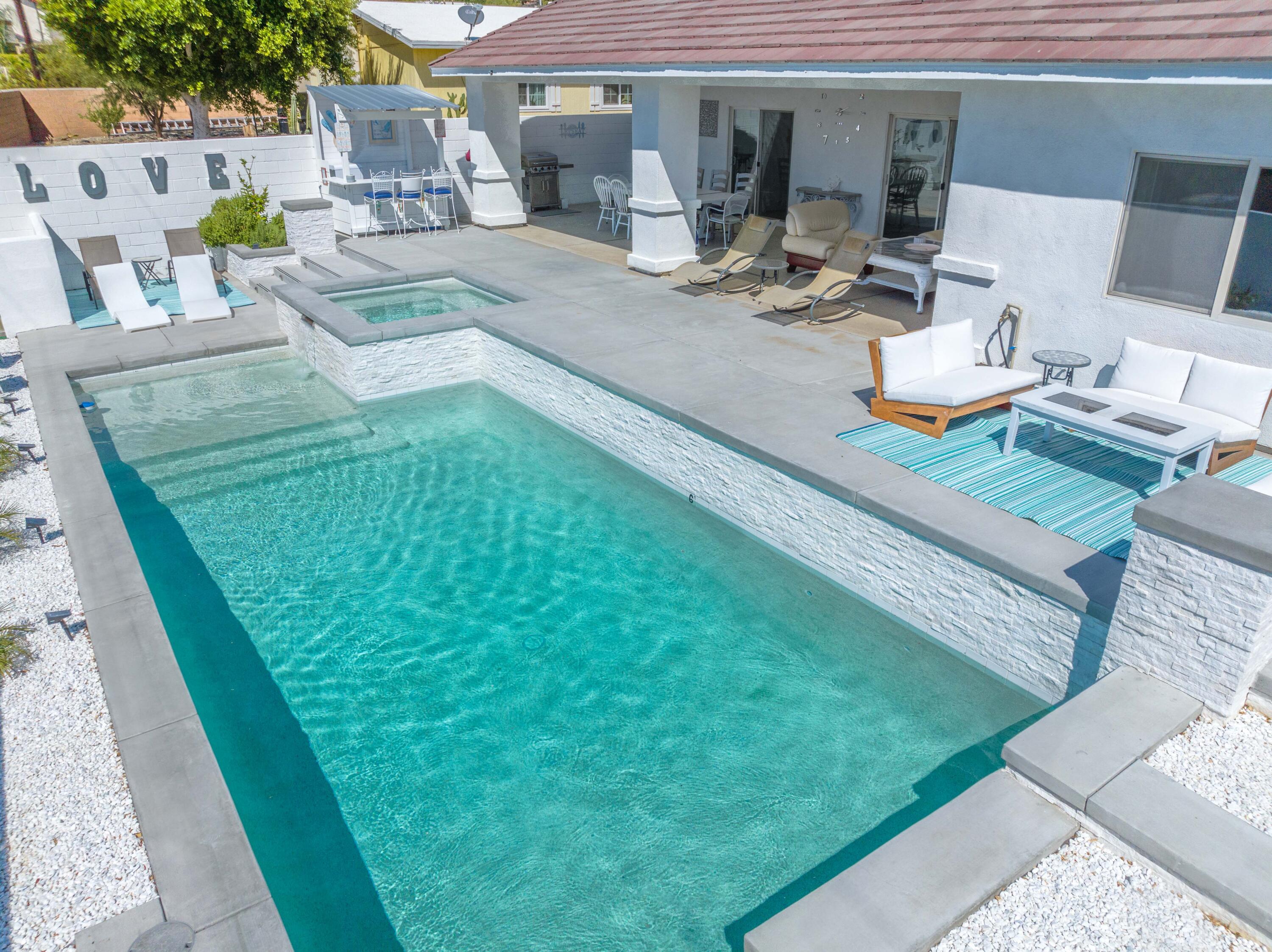 12753 Mountain View Road Desert Hot Springs, CA 92240 - Photo 3 of 45 a view of backyard of the house