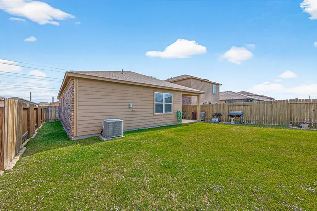 a view of a backyard with a garden