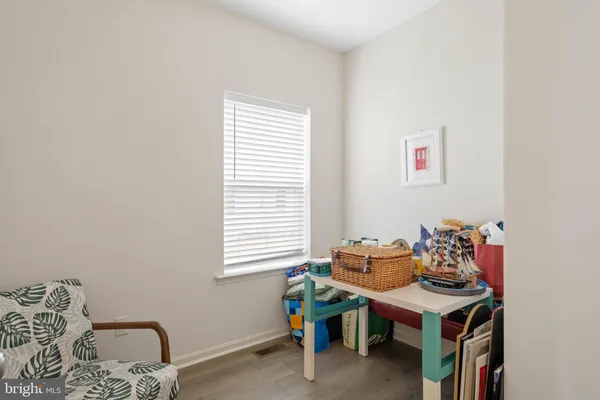 a room with furniture and window