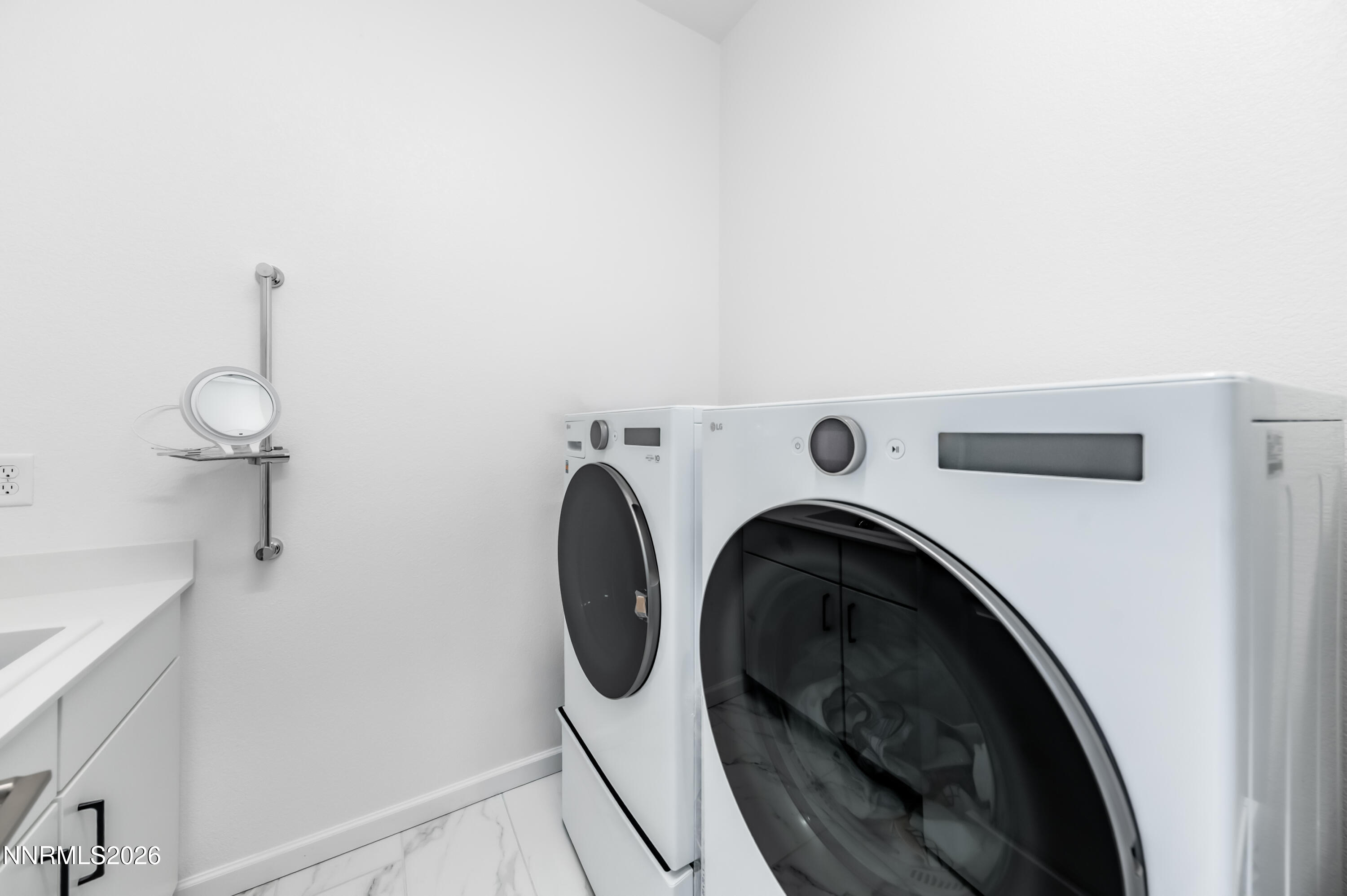 2402 Iron Square Drive Reno, NV 89521 - Photo 18 of 30 a utility room with dryer and washer