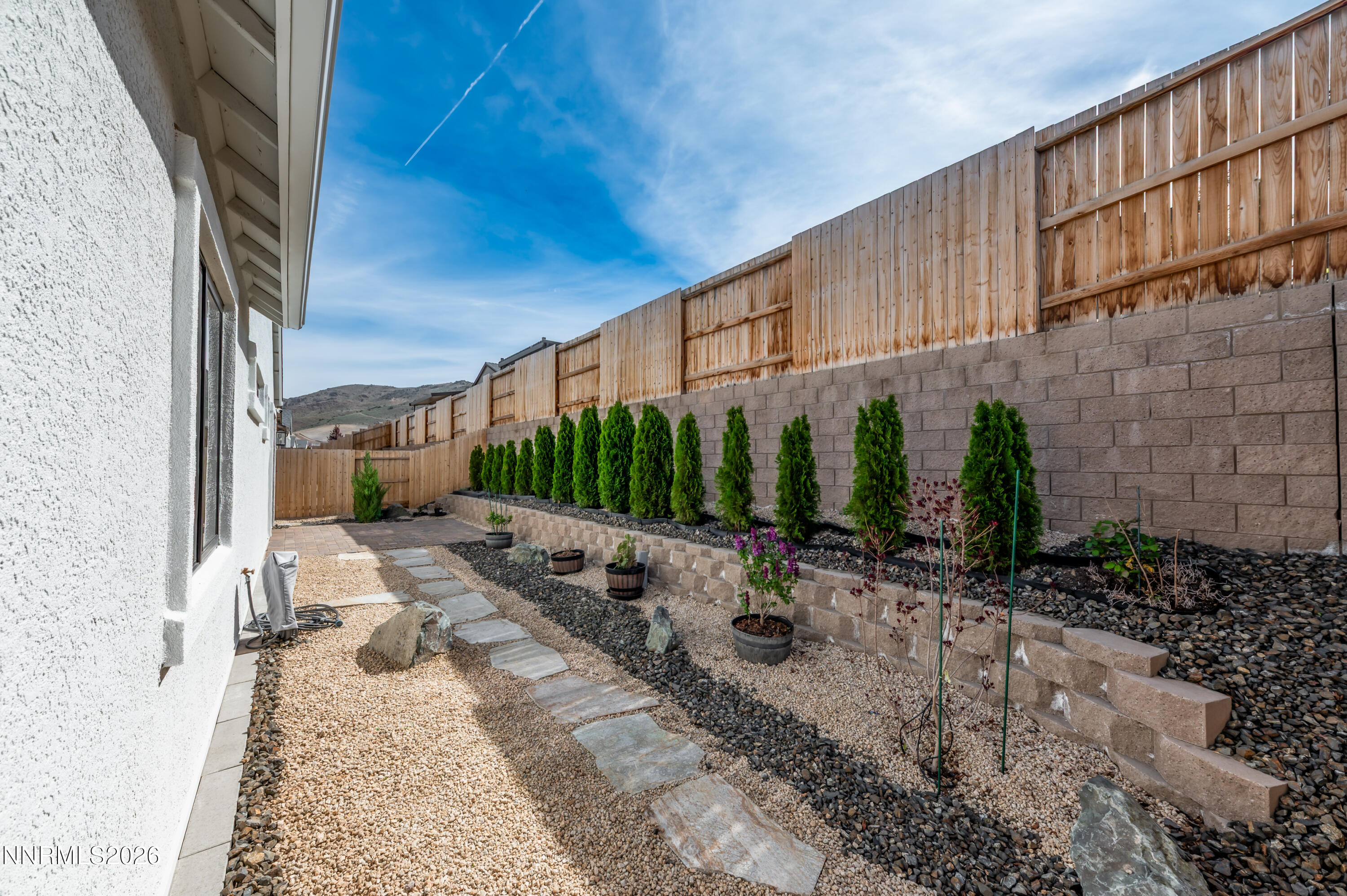 2402 Iron Square Drive Reno, NV 89521 - Photo 23 of 30 a view of a back yard of the house