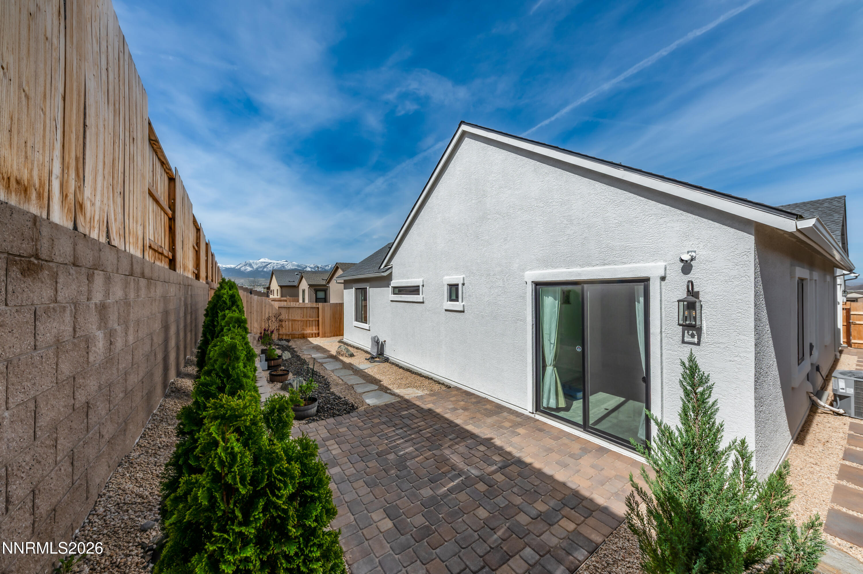 2402 Iron Square Drive Reno, NV 89521 - Photo 25 of 30 a view of a house with a backyard