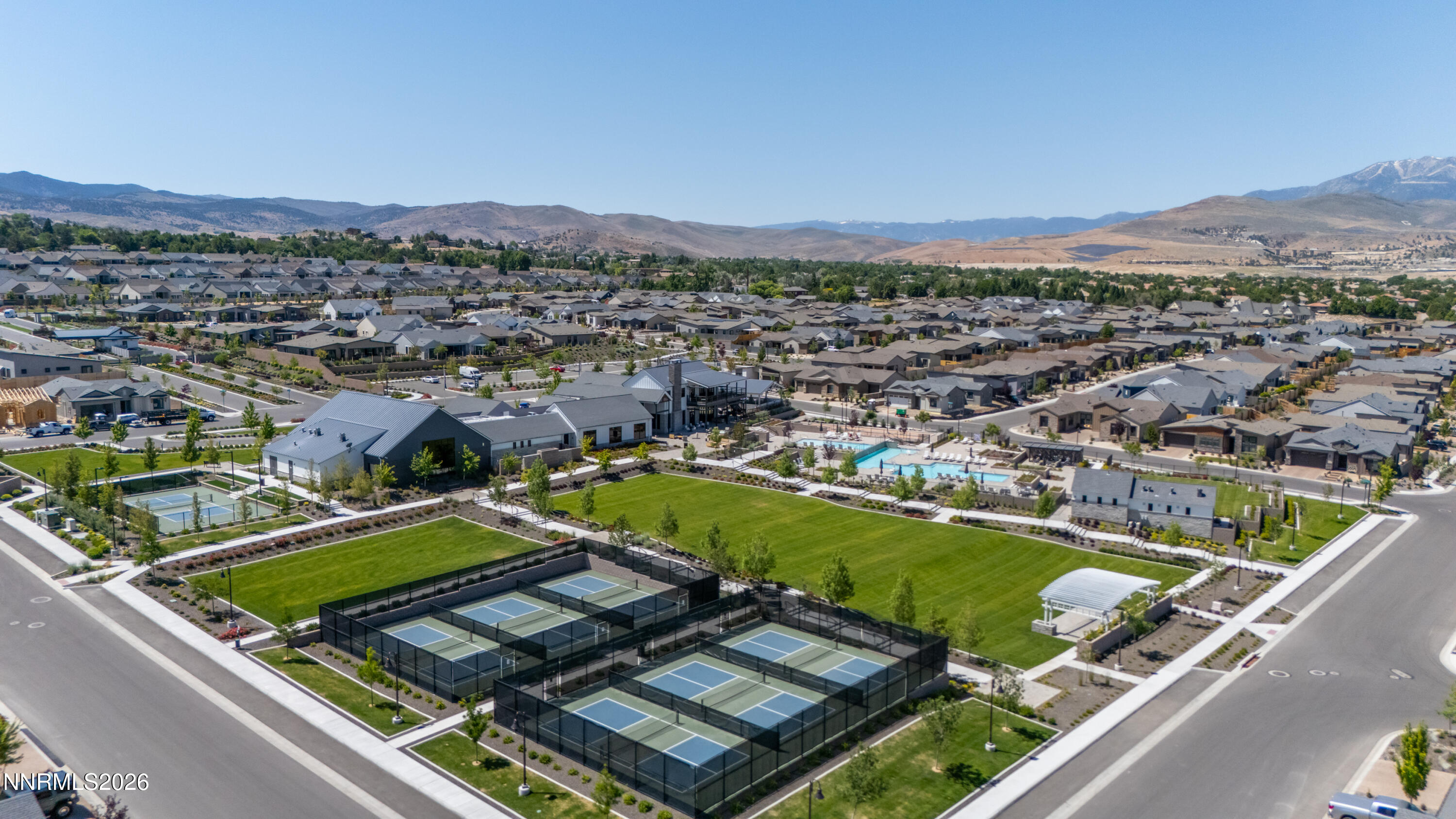 2402 Iron Square Drive Reno, NV 89521 - Photo 28 of 30 an aerial view of a residential houses with a swimming pool and mountains