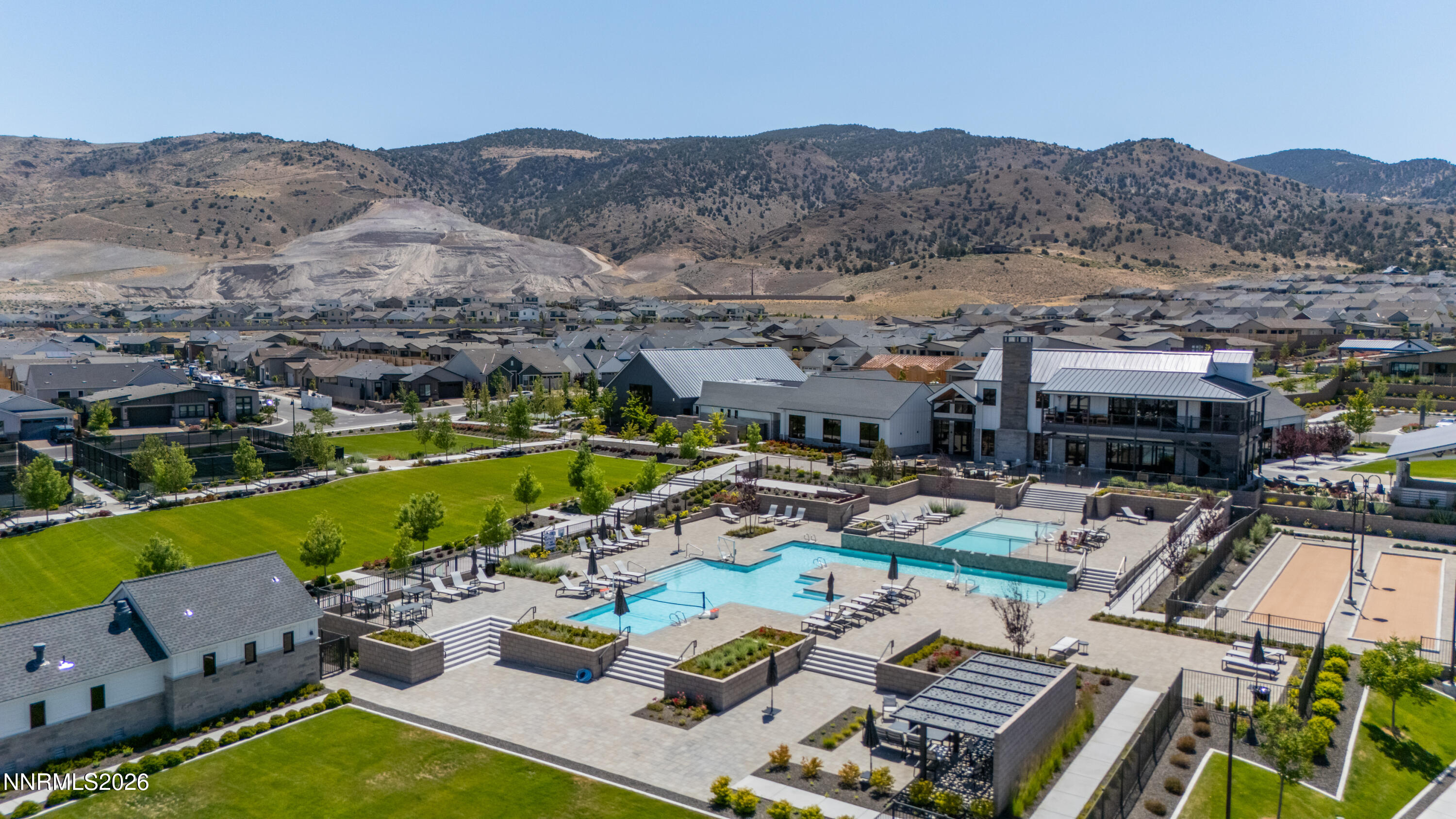 2402 Iron Square Drive Reno, NV 89521 - Photo 30 of 30 an aerial view of a house with swimming pool and mountains