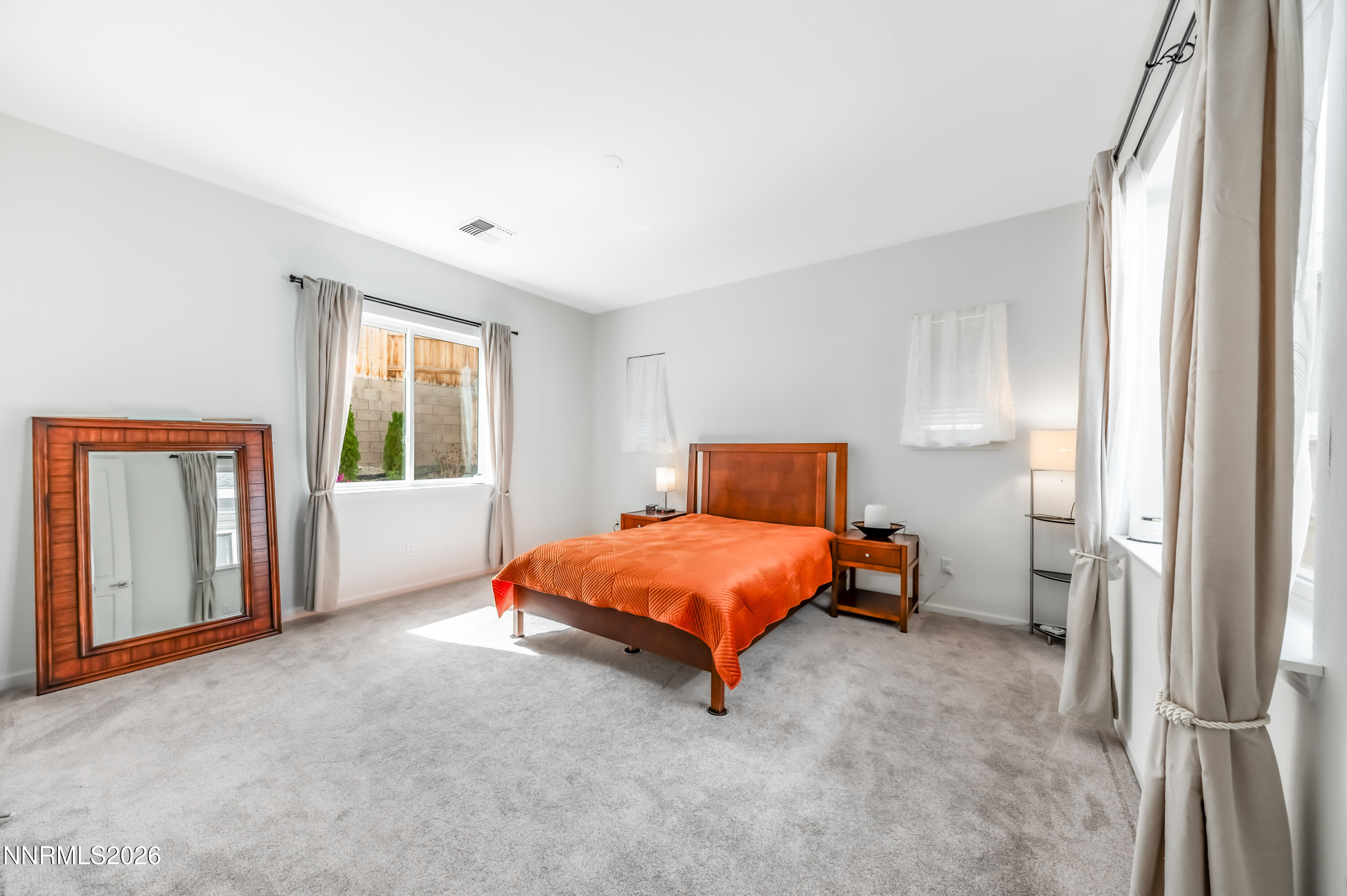 2402 Iron Square Drive Reno, NV 89521 - Photo 5 of 30 a bedroom with a bed and a window