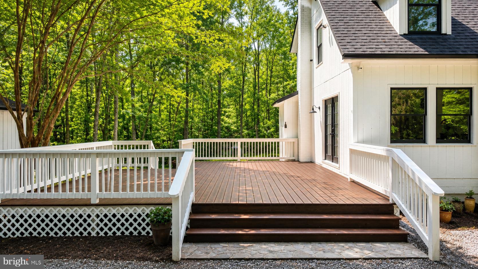 2208 Cartersville Road Mineral, VA 23117 - Photo 32 of 44 Serene deck nestled in lush greenery.