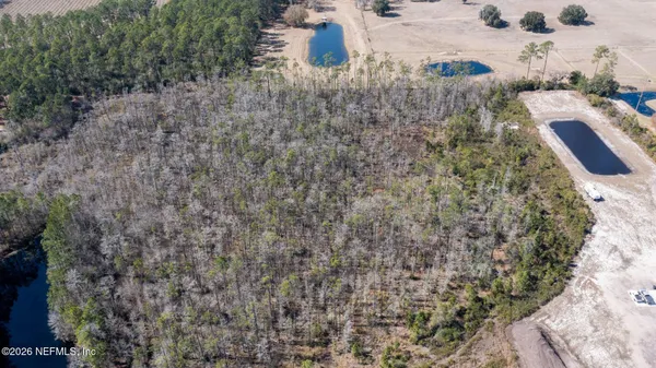 a view of lake with green space