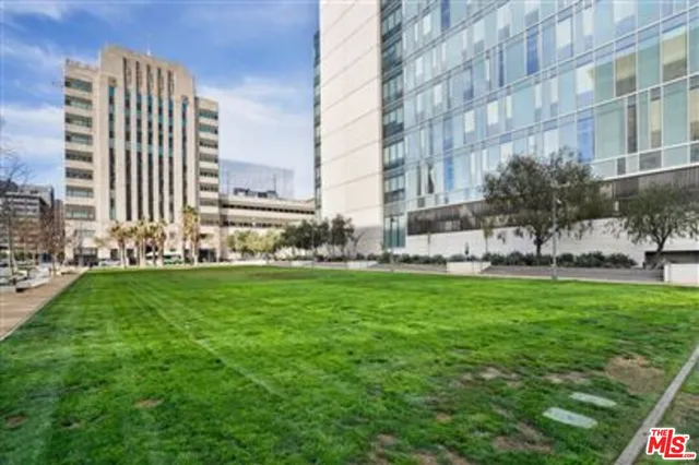 a city view with a building in the background