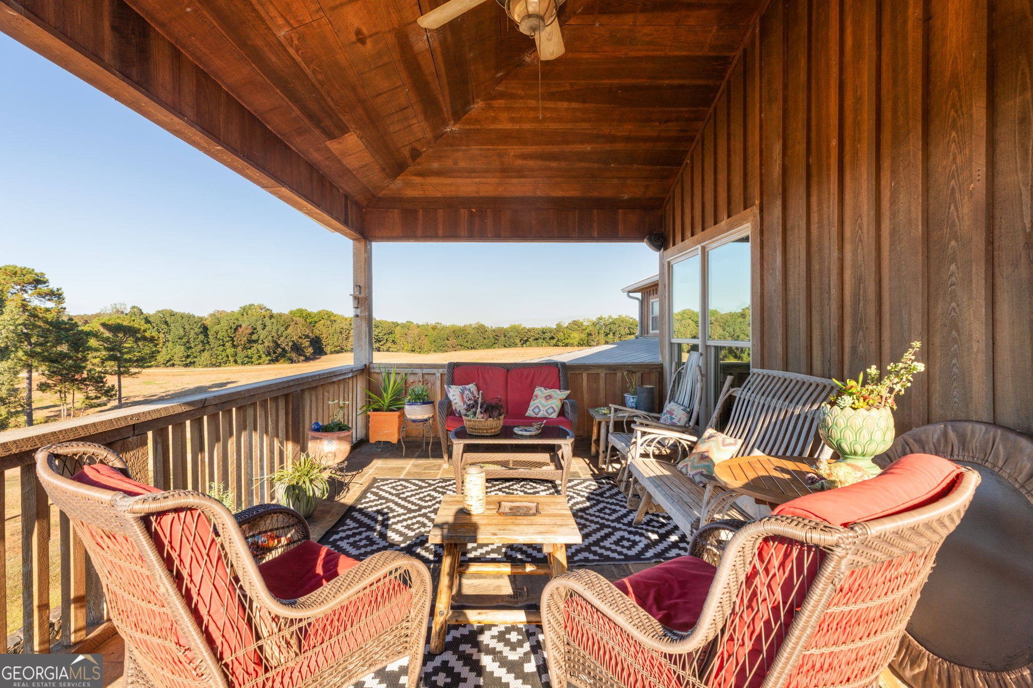 120 Torbet Road Forsyth, GA 31029 - Photo 101 of 118 a view of a balcony with chairs