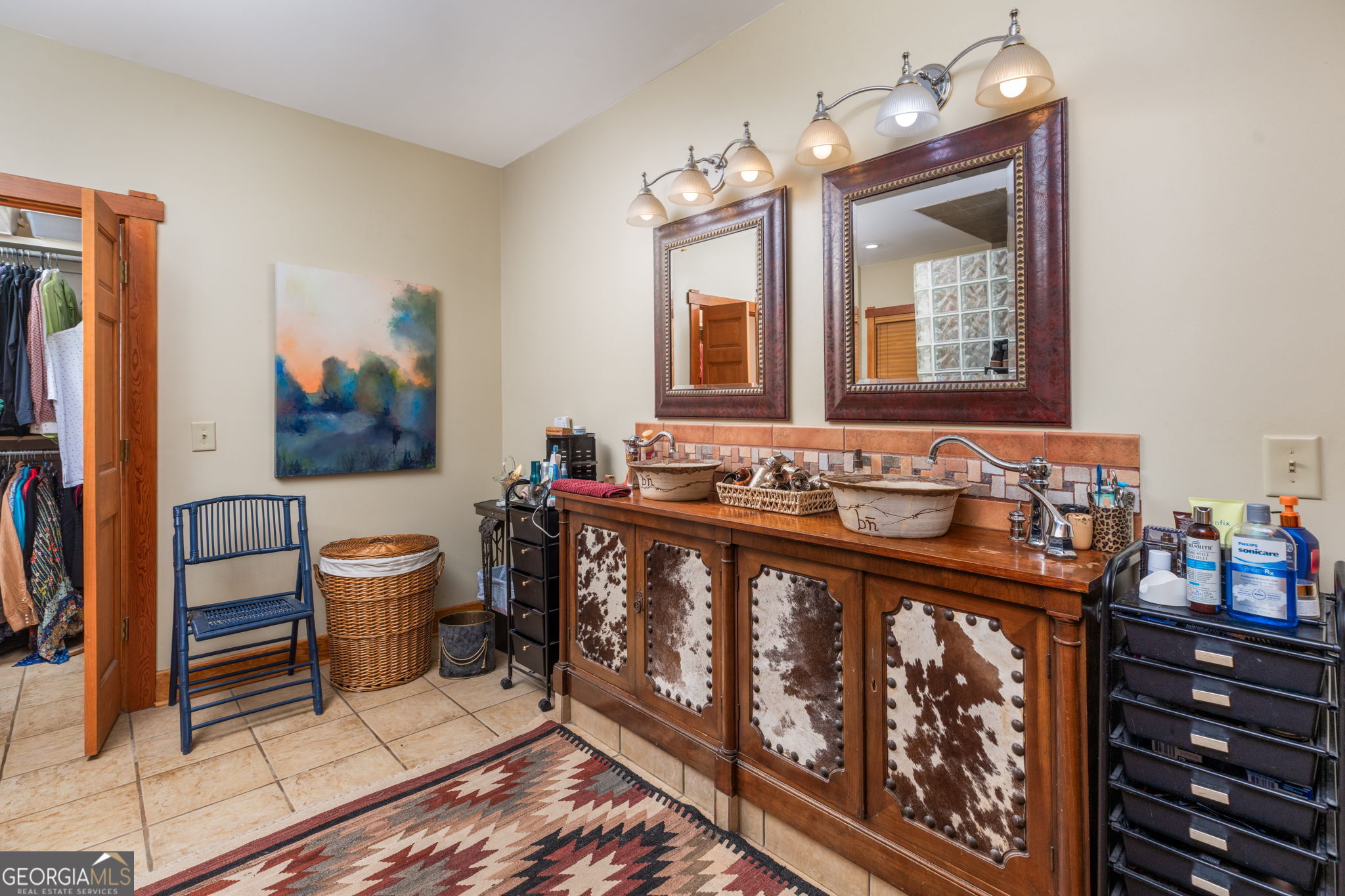 120 Torbet Road Forsyth, GA 31029 - Photo 114 of 118 a bathroom with a sink a toilet a mirror and shower