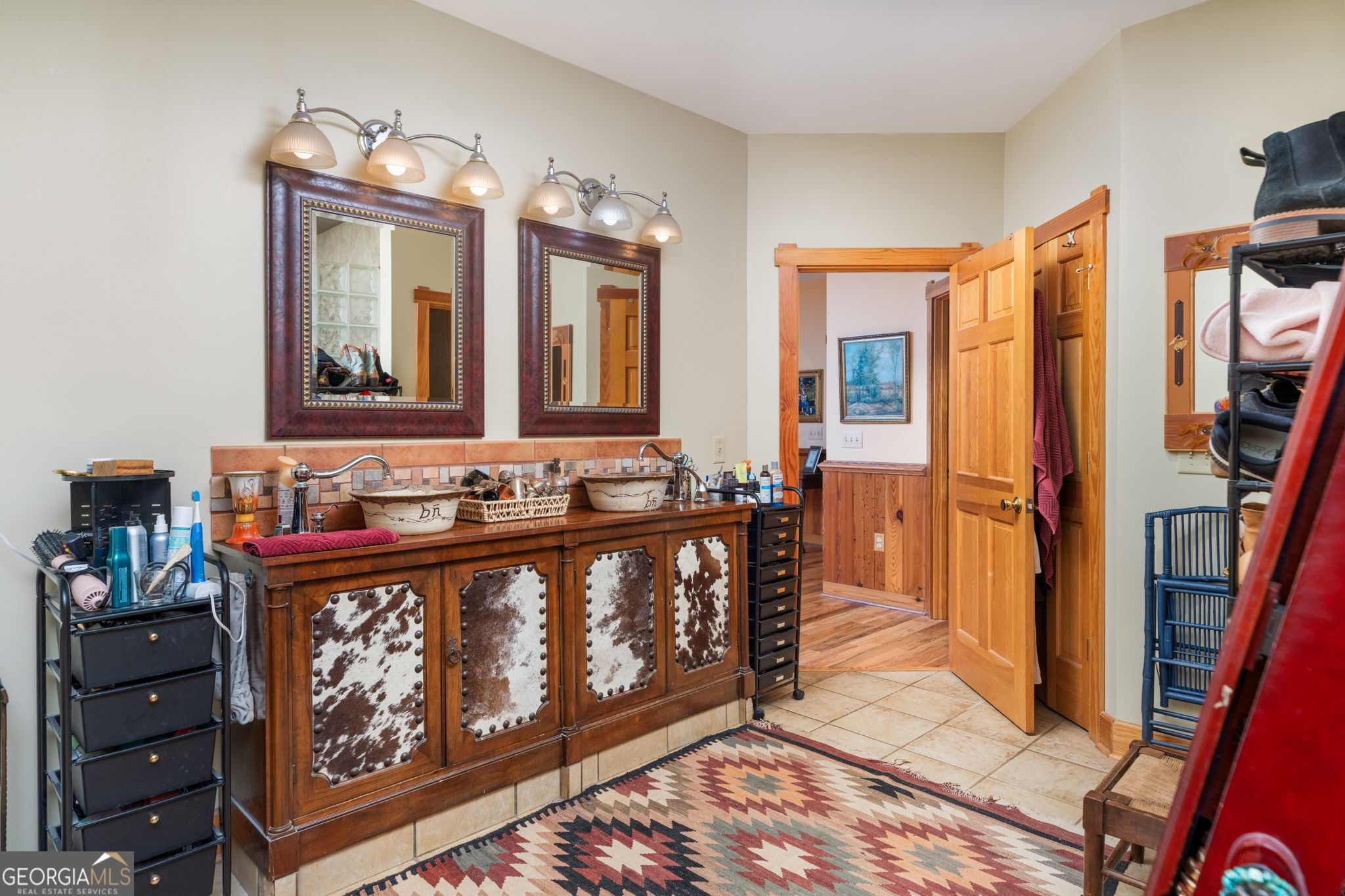 120 Torbet Road Forsyth, GA 31029 - Photo 117 of 118 a view of a hallway with wooden floor and staircase