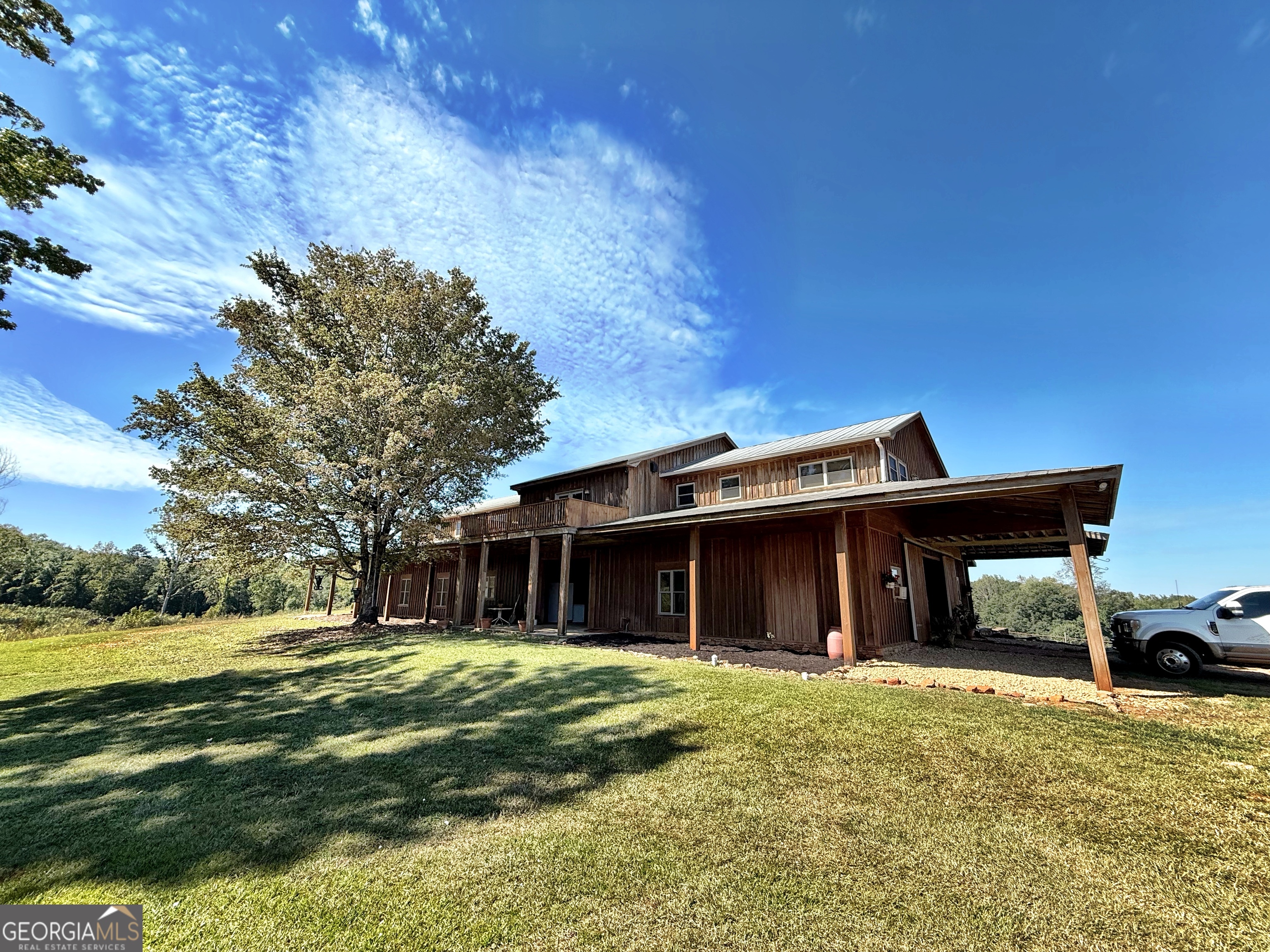 120 Torbet Road Forsyth, GA 31029 - Photo 17 of 118 a view of a house with a yard