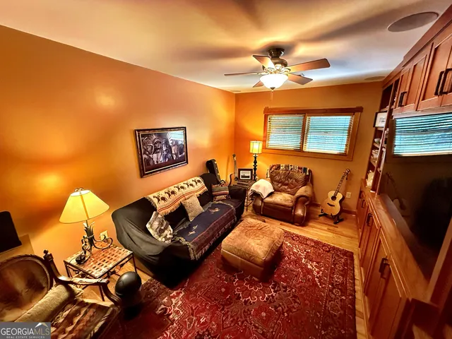 a front view of a house with sitting area