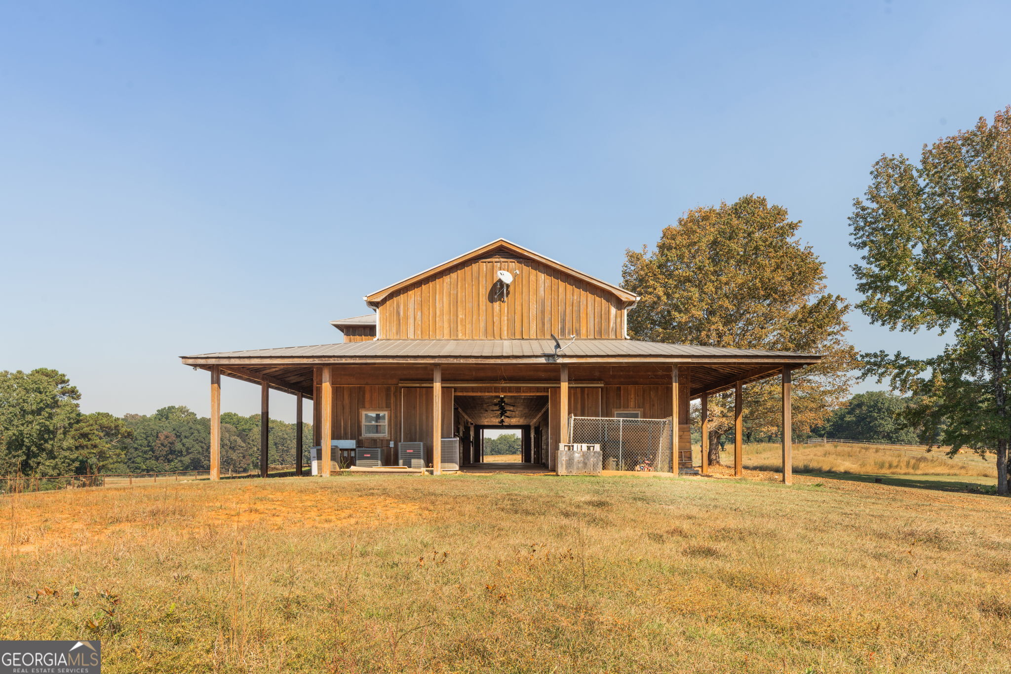 120 Torbet Road Forsyth, GA 31029 - Photo 3 of 118 a view of a house with a yard and balcony