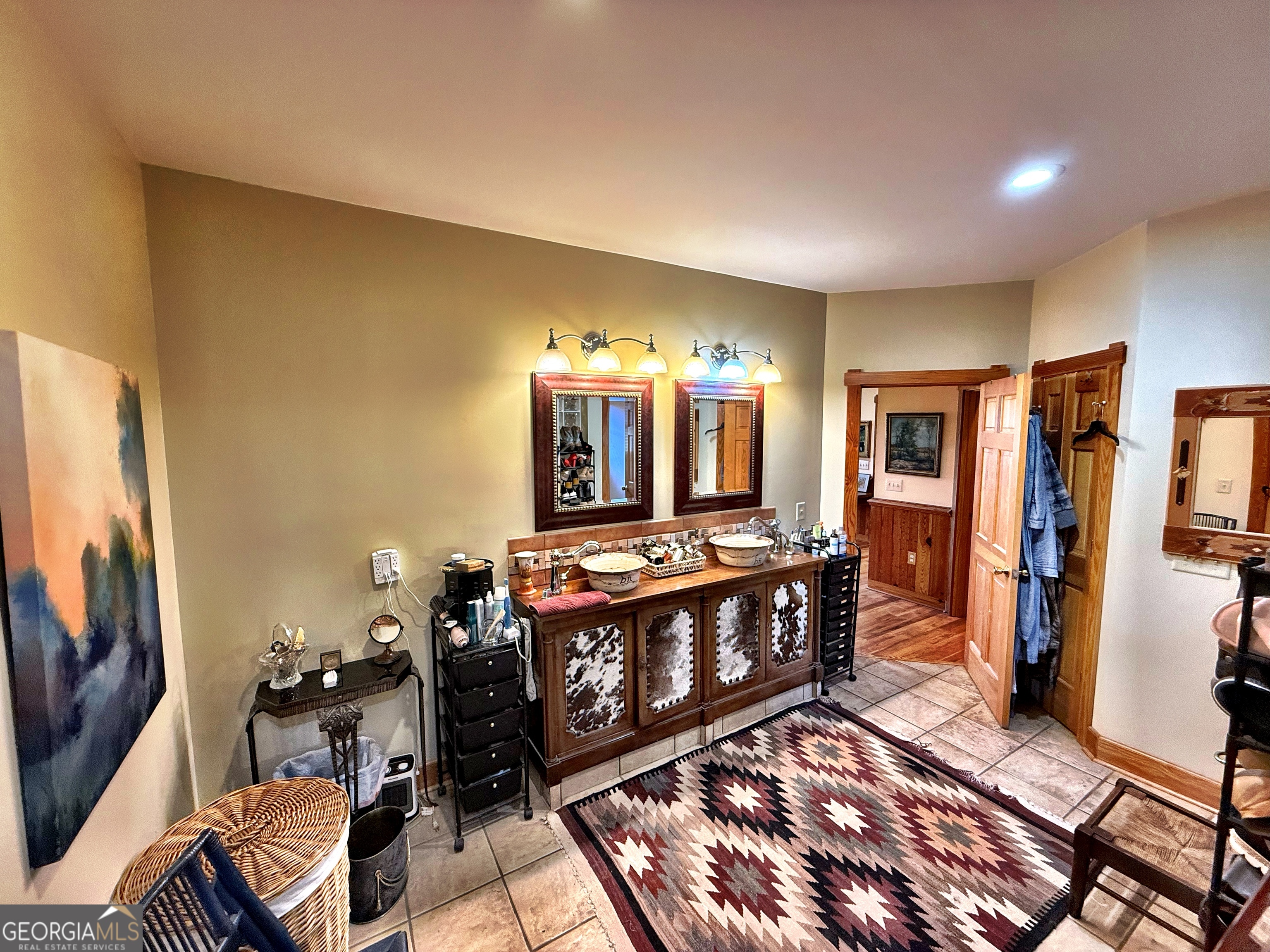120 Torbet Road Forsyth, GA 31029 - Photo 32 of 118 a view of living room kitchen with furniture and a flat screen tv