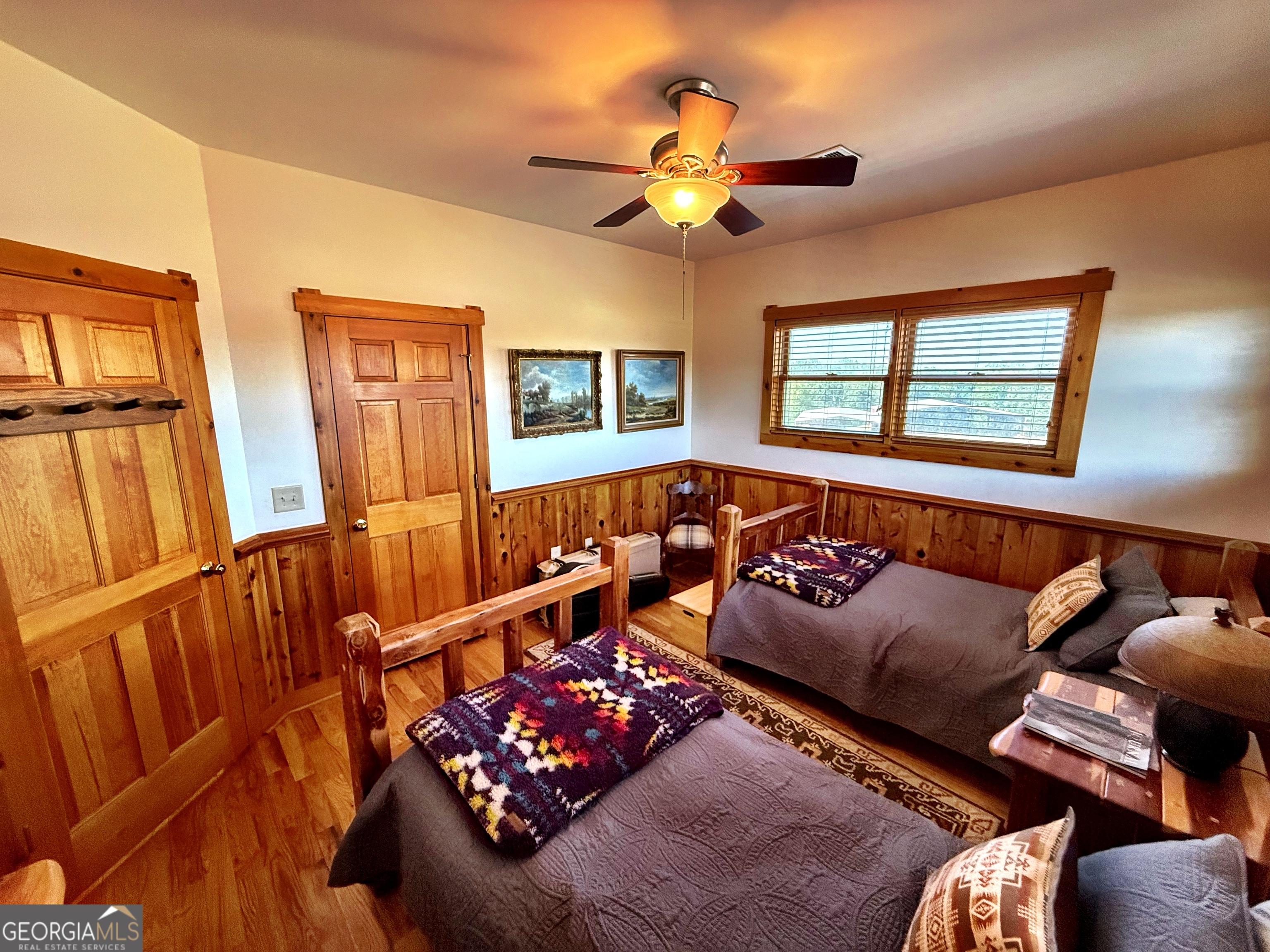 120 Torbet Road Forsyth, GA 31029 - Photo 40 of 118 a living room with furniture and wooden floor