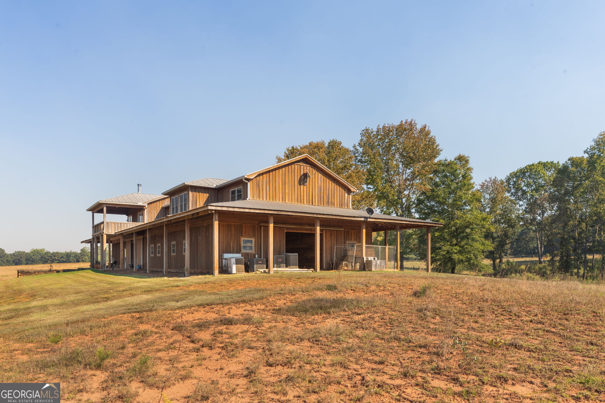120 Torbet Road Forsyth, GA 31029 - Photo 4 of 118 a front view of a house with a yard