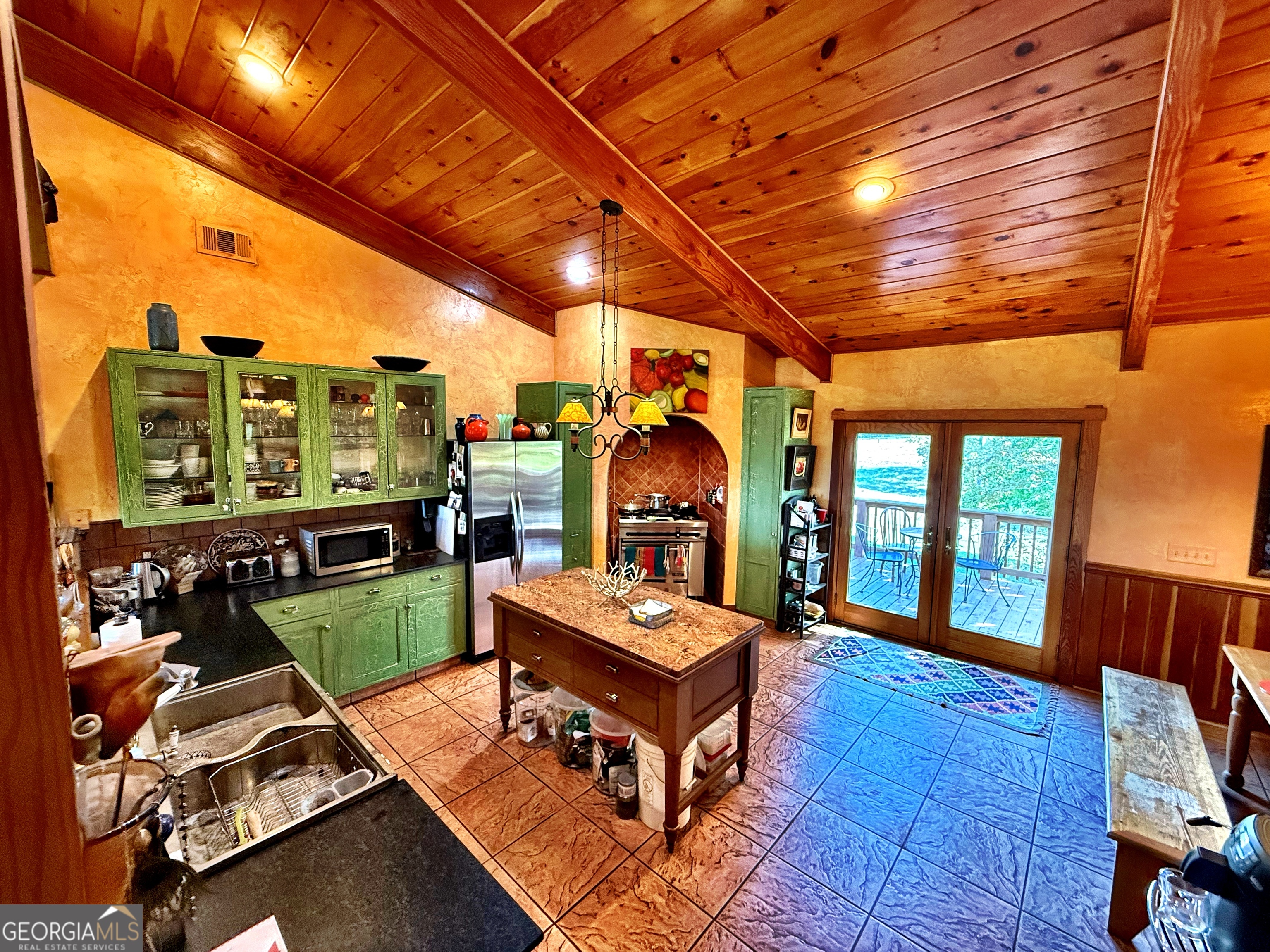 120 Torbet Road Forsyth, GA 31029 - Photo 50 of 118 a living room with furniture a rug and a table