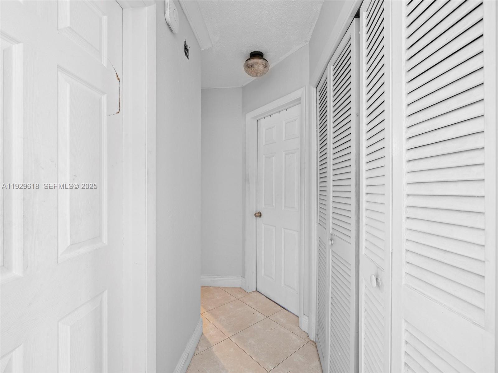 4461 Northwest 6th Street Plantation, FL 33317 - Photo 17 of 30 a view of a hallway