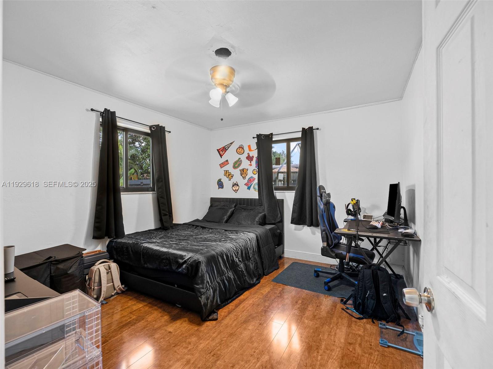 4461 Northwest 6th Street Plantation, FL 33317 - Photo 20 of 30 a bedroom with bed and window