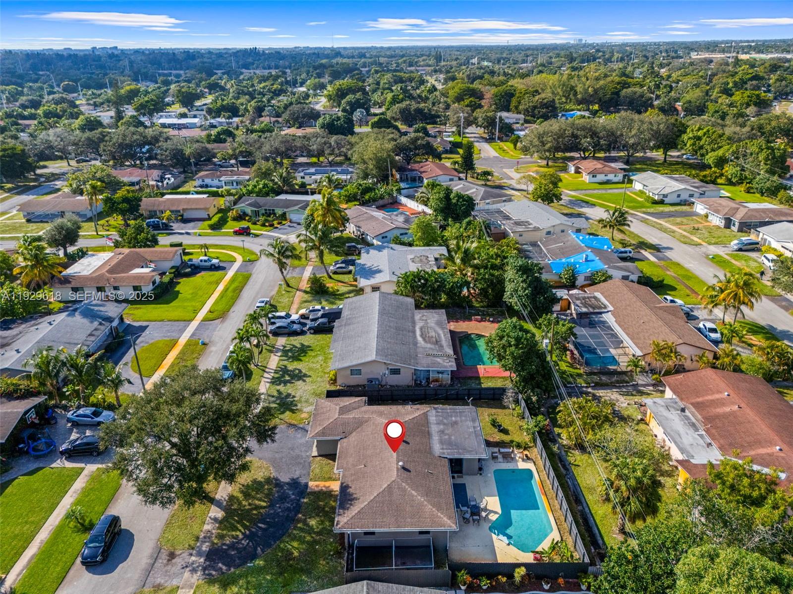 4461 Northwest 6th Street Plantation, FL 33317 - Photo 28 of 30 an aerial view of residential houses with outdoor space and parking