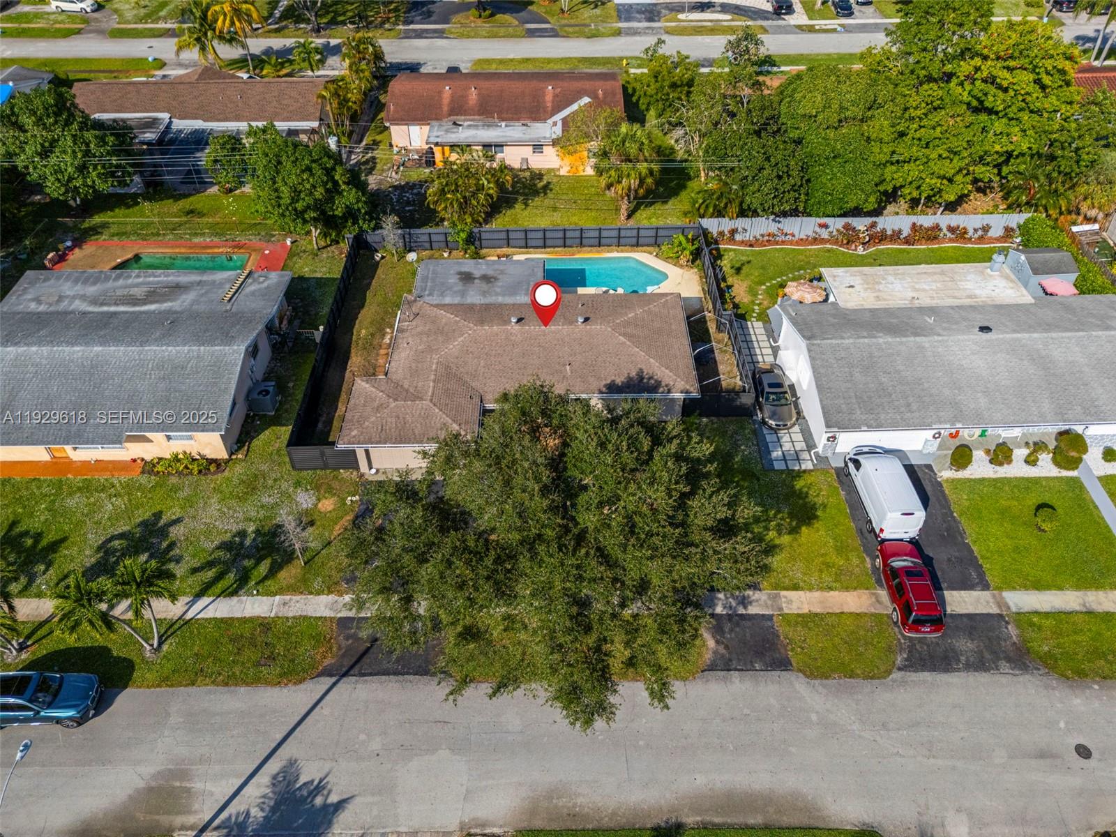 4461 Northwest 6th Street Plantation, FL 33317 - Photo 29 of 30 an aerial view of a swimming pool with a yard and plants