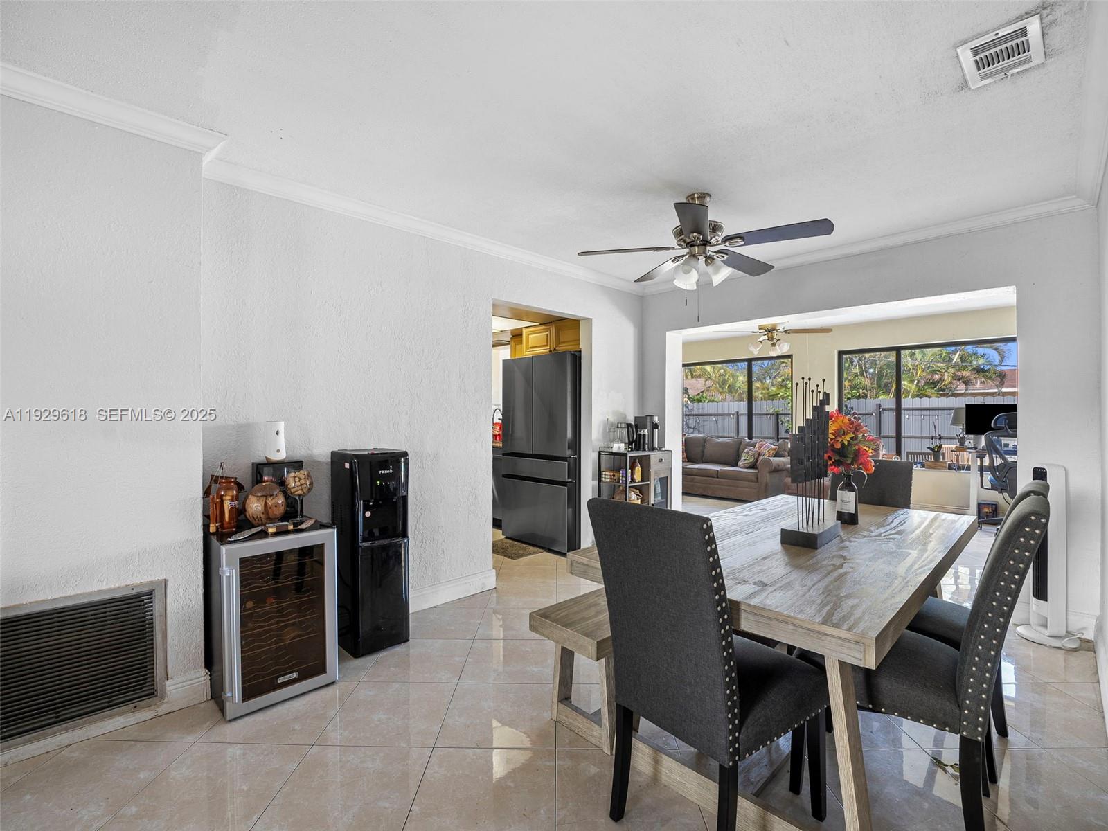 4461 Northwest 6th Street Plantation, FL 33317 - Photo 8 of 30 a dining room with furniture and window