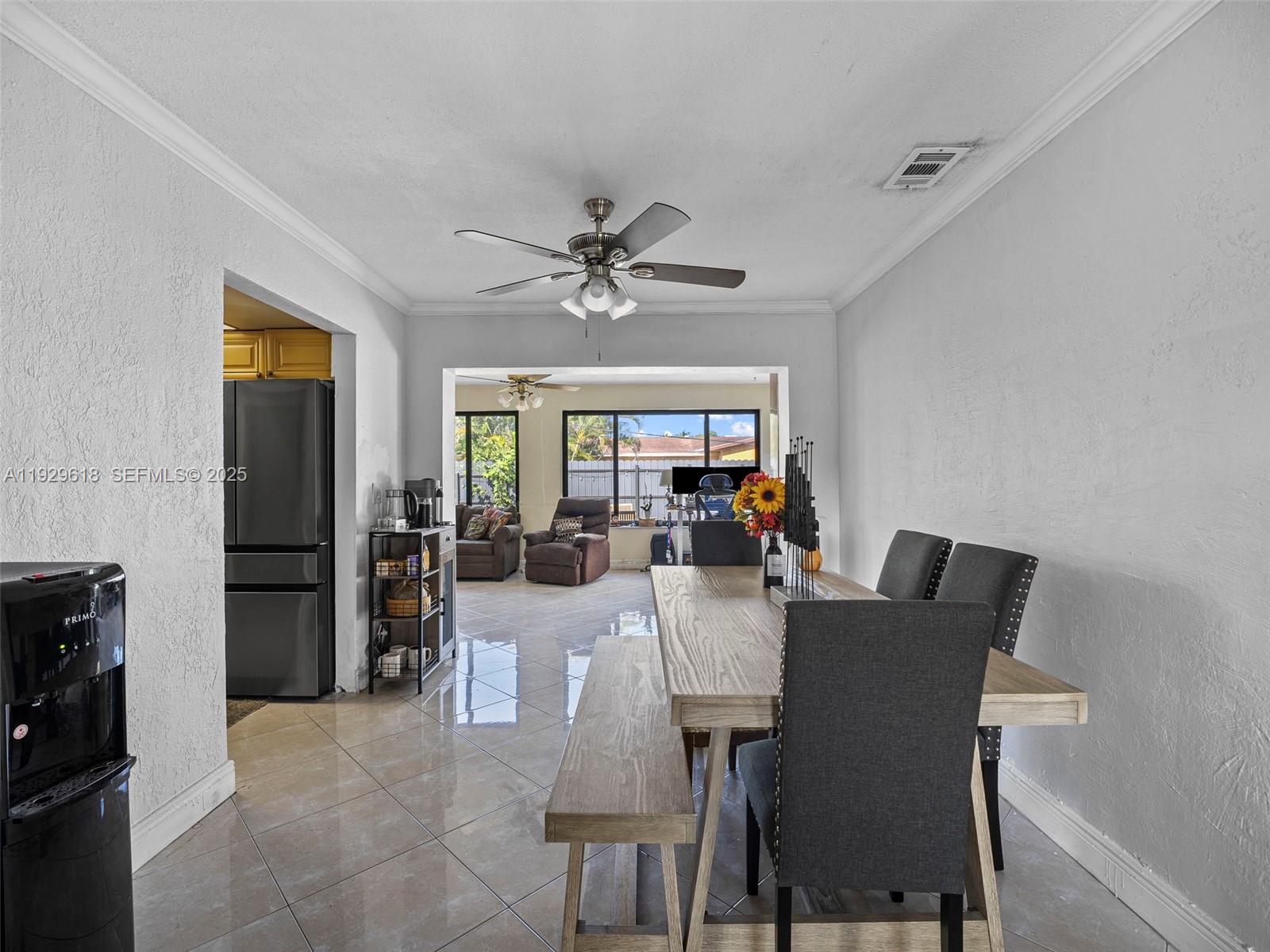4461 Northwest 6th Street Plantation, FL 33317 - Photo 9 of 30 a view of a dining room with furniture